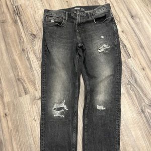 Slim Built-In-Flex Jeans For Men. Black de stressed